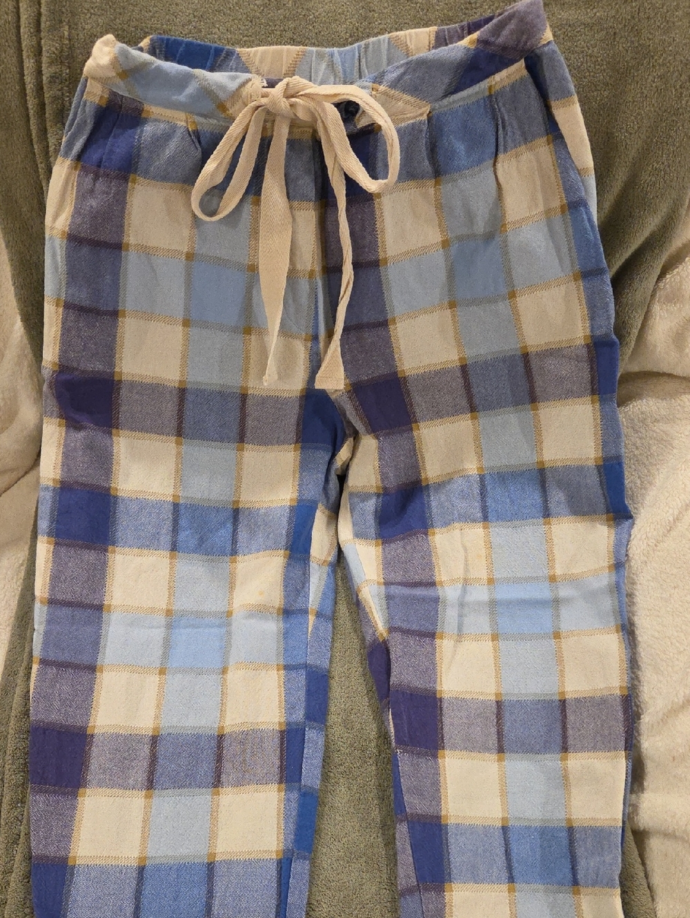 Blue and white checkered pajama-style trousers from the Italian brand Marché 21,